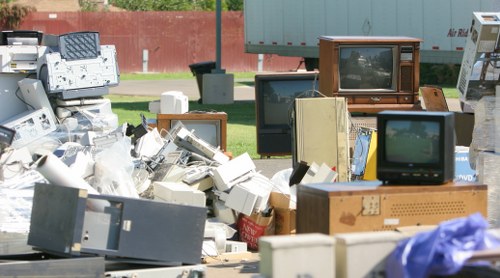 Interior of a local transfer station with sorted recycling containers